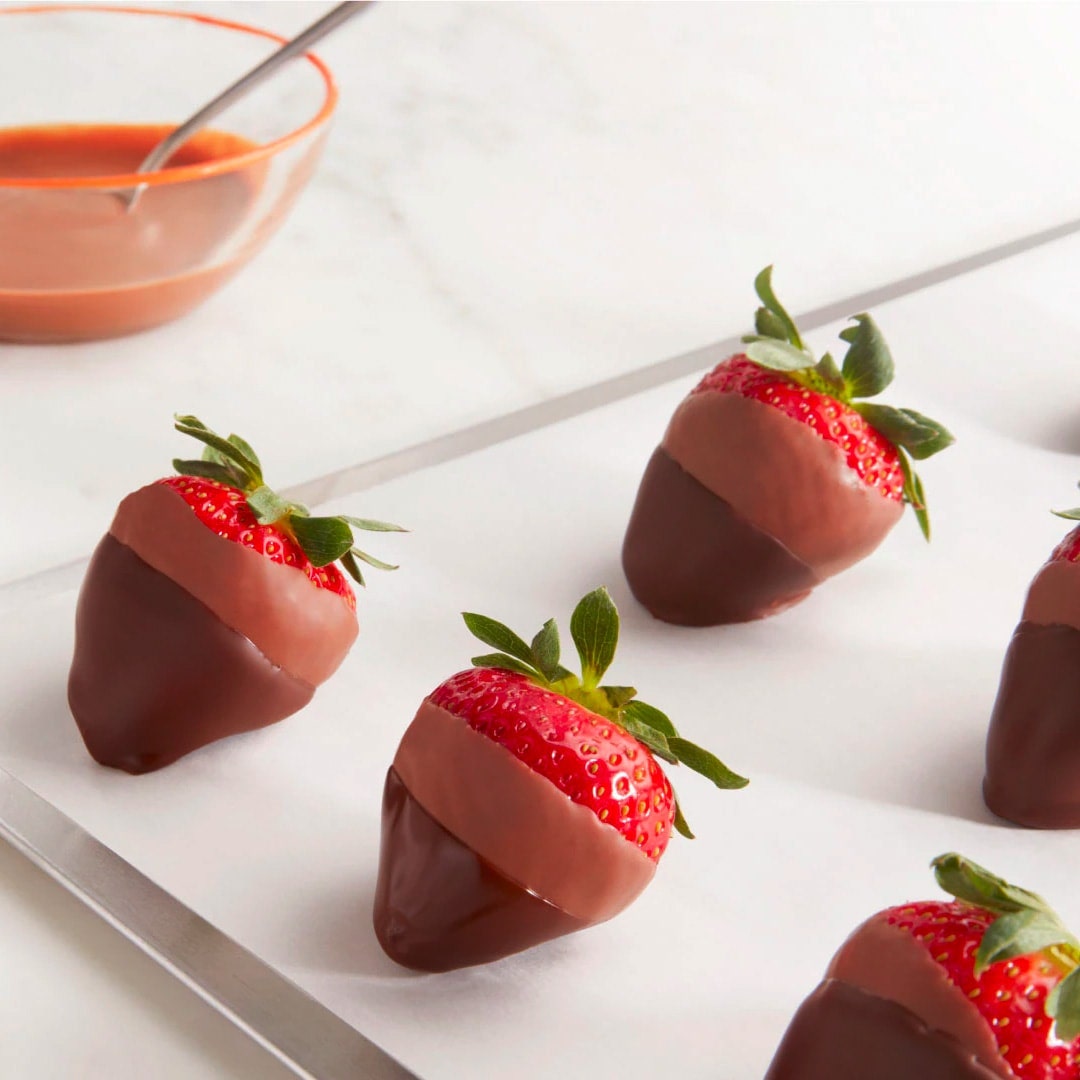 Strawberries dipped in milk and dark chocolate