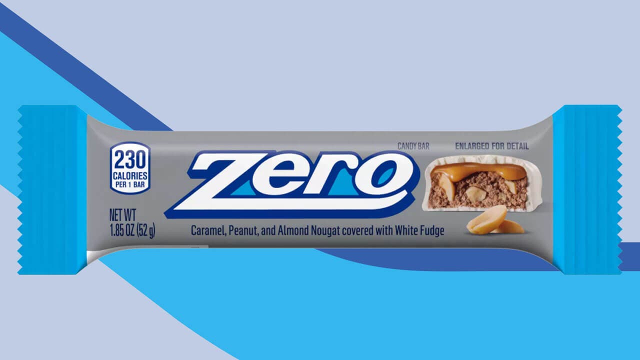 zero caramel, peanut, and almond nougat covered in white fudge candy bar