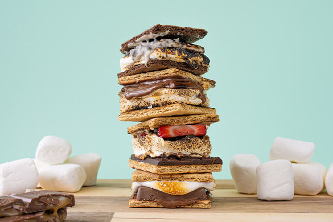 stack of hersheys smores made with different chocolates and fillings