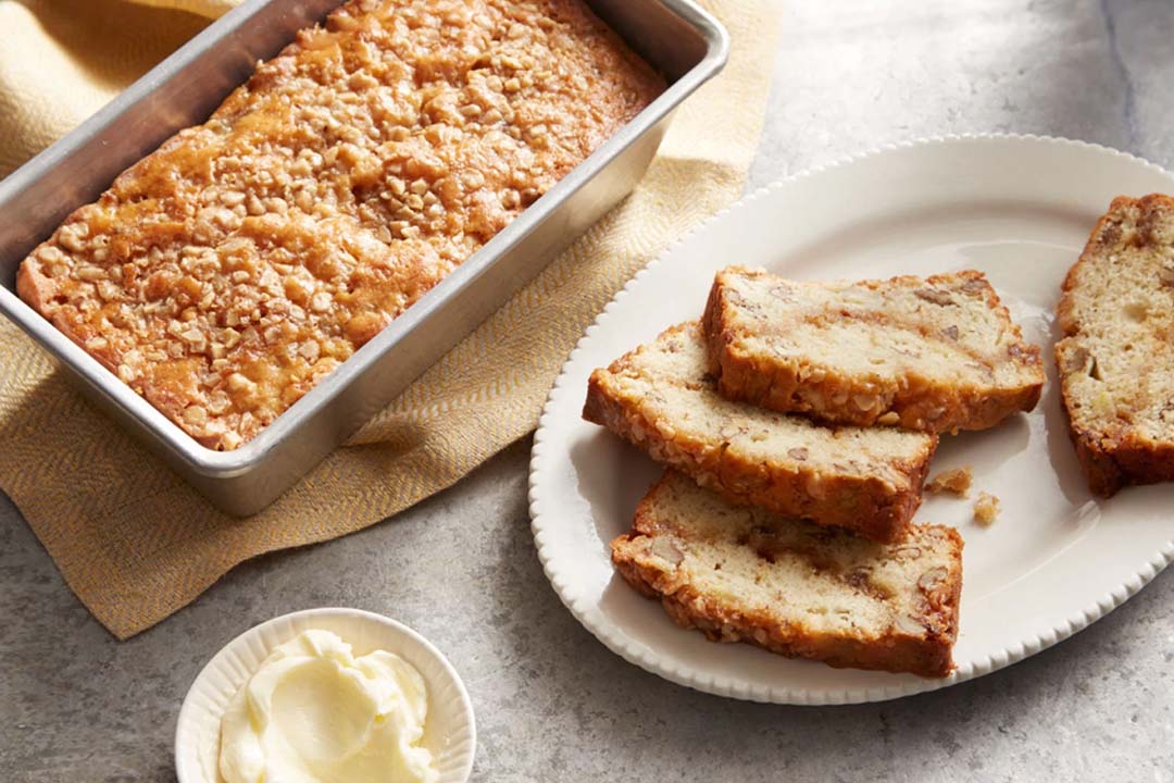 heath toffee banana bread rum bread being sliced and served